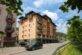 Apartamenty na pierwszym pietrze, Krynica